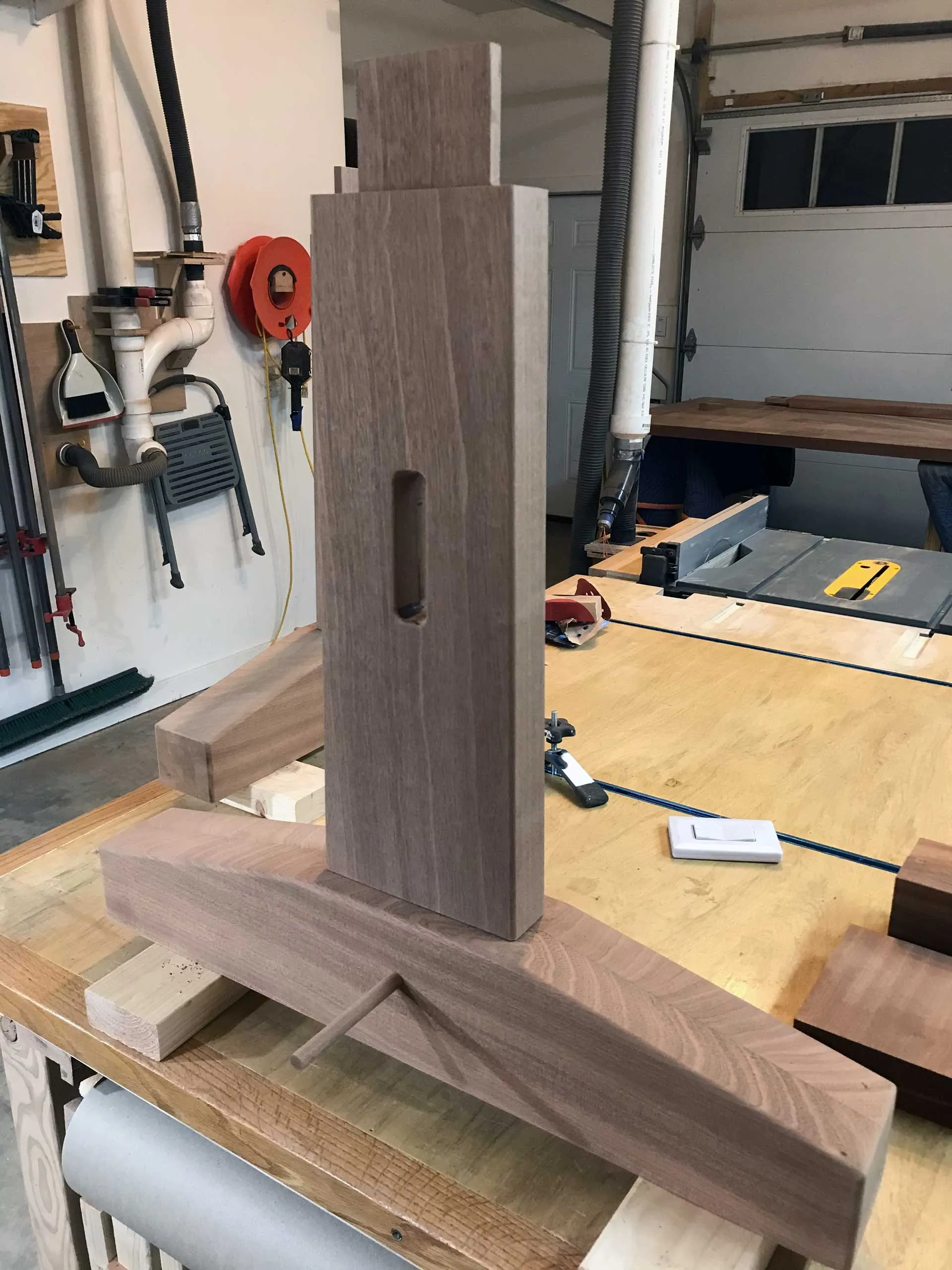 Trestle table stretcher mortise being cut