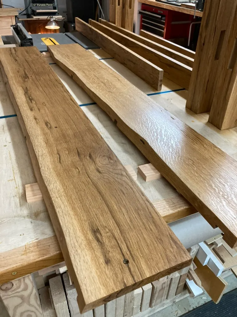 Close-up of the finished bed leg's castle joint, an oak post with an exposed tenon