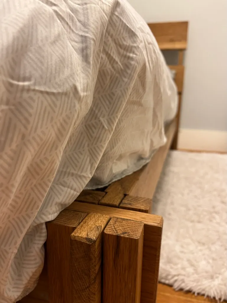 White oak bed headboard live edge detail