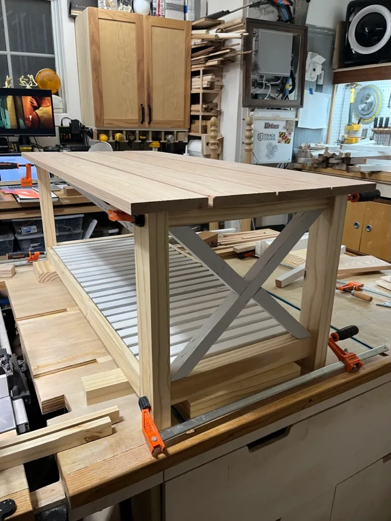 Oak boards for the coffee table being dry-fit on the workbench