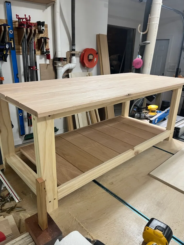 Gluing up the coffee table's lower shelf slats