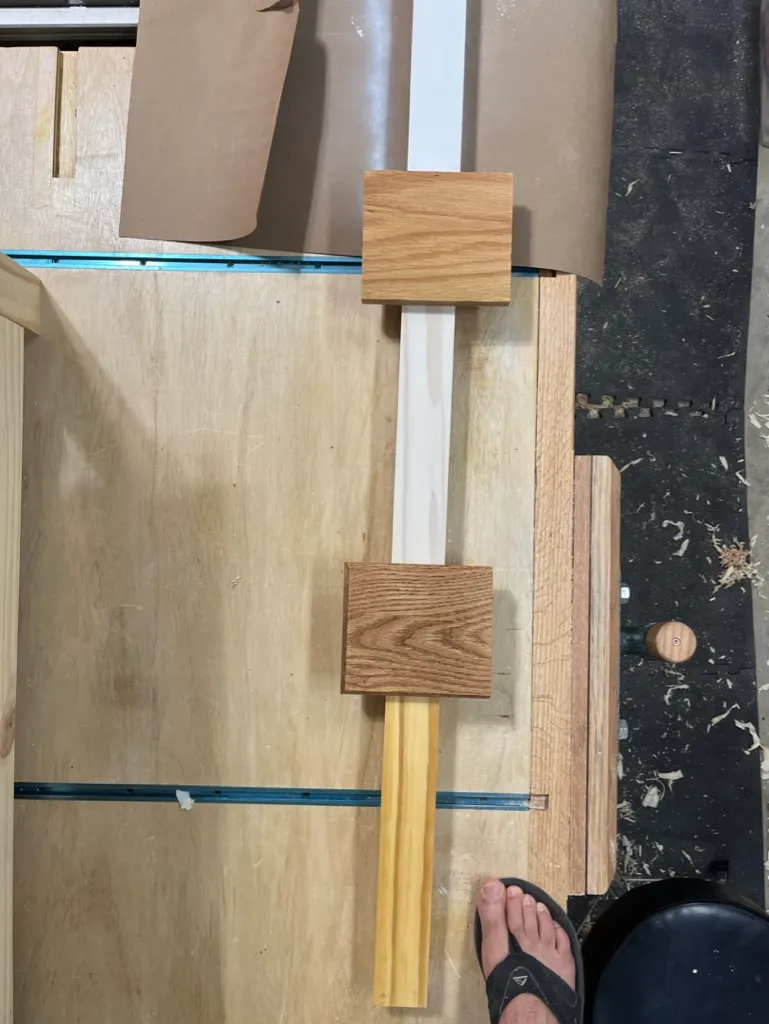 Coffee table shelf slat being trimmed to length
