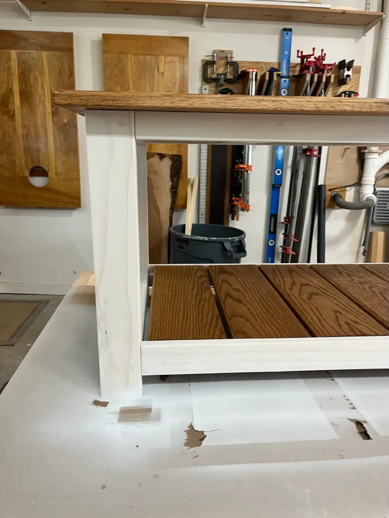 Coffee table shelf assembly nearly complete
