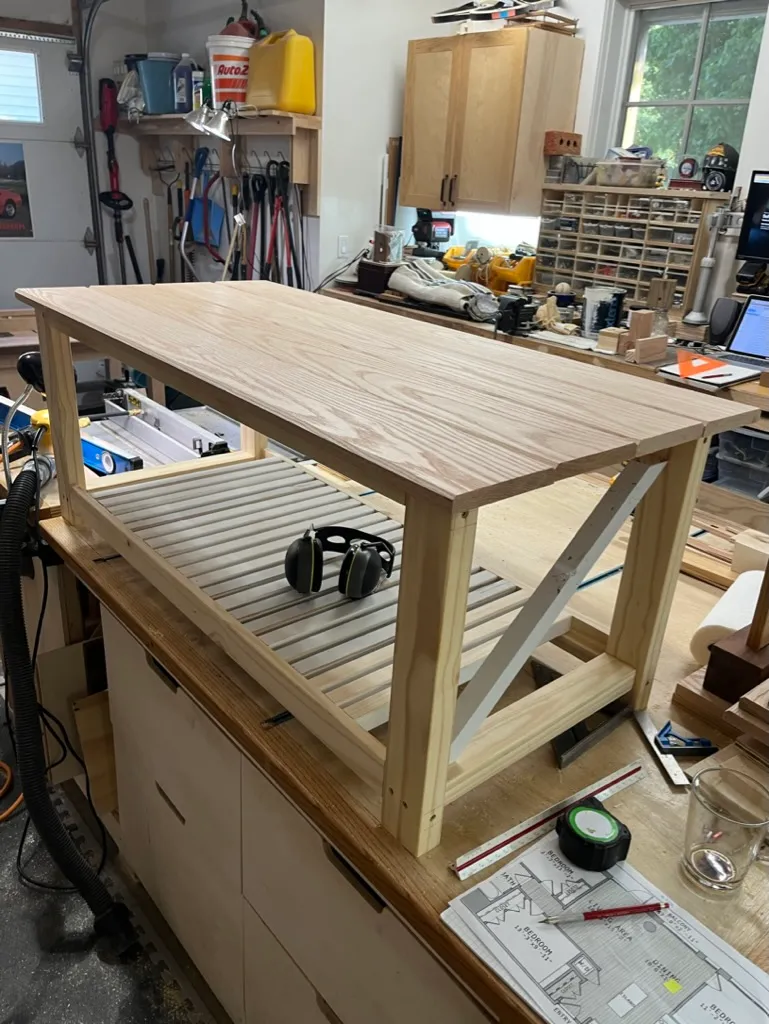 Coffee table shelf slats laid out before assembly