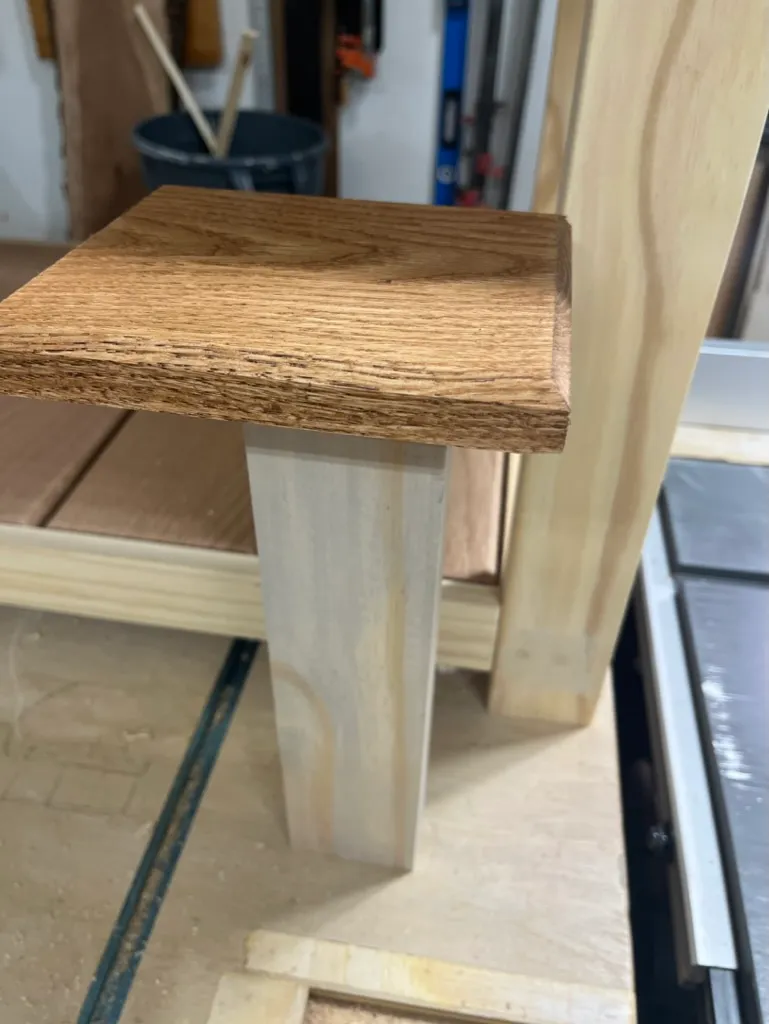 Test-fitting the coffee table's off-white leg and apron joint