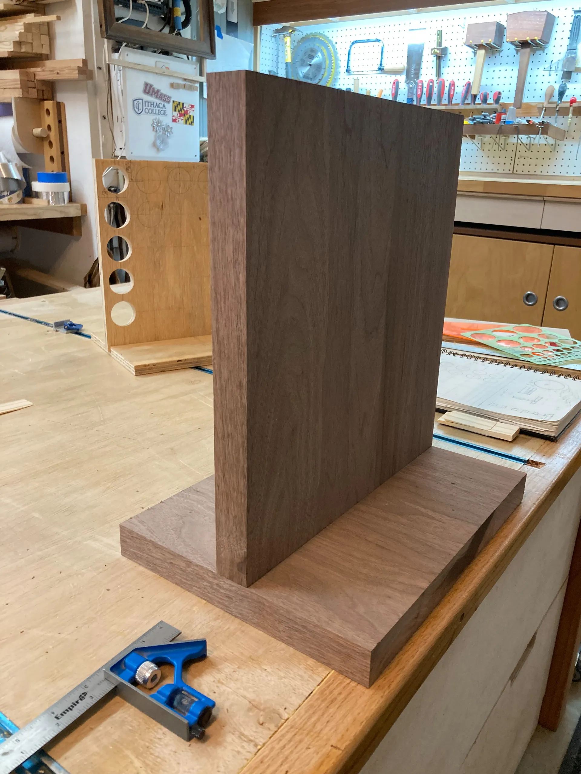 Drilling holes in the walnut spice rack panel