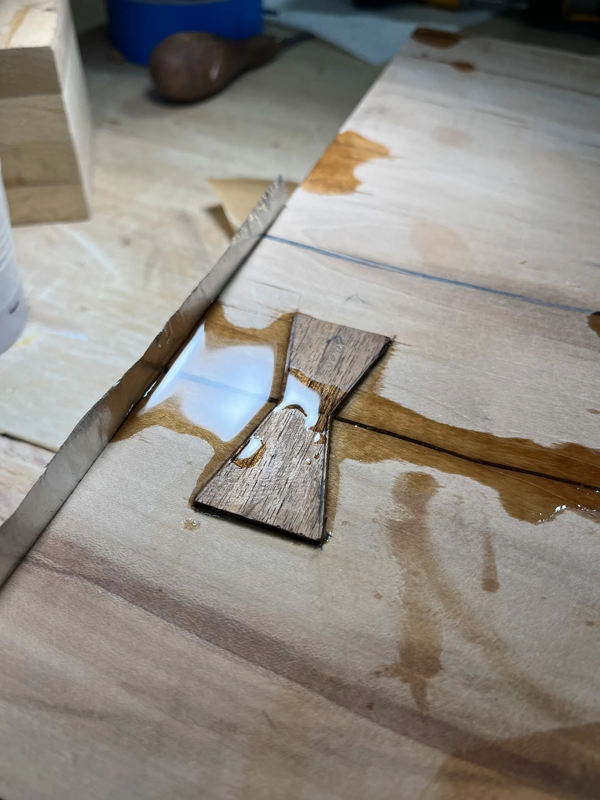 Fitting the walnut bowtie inlay into the cutting board