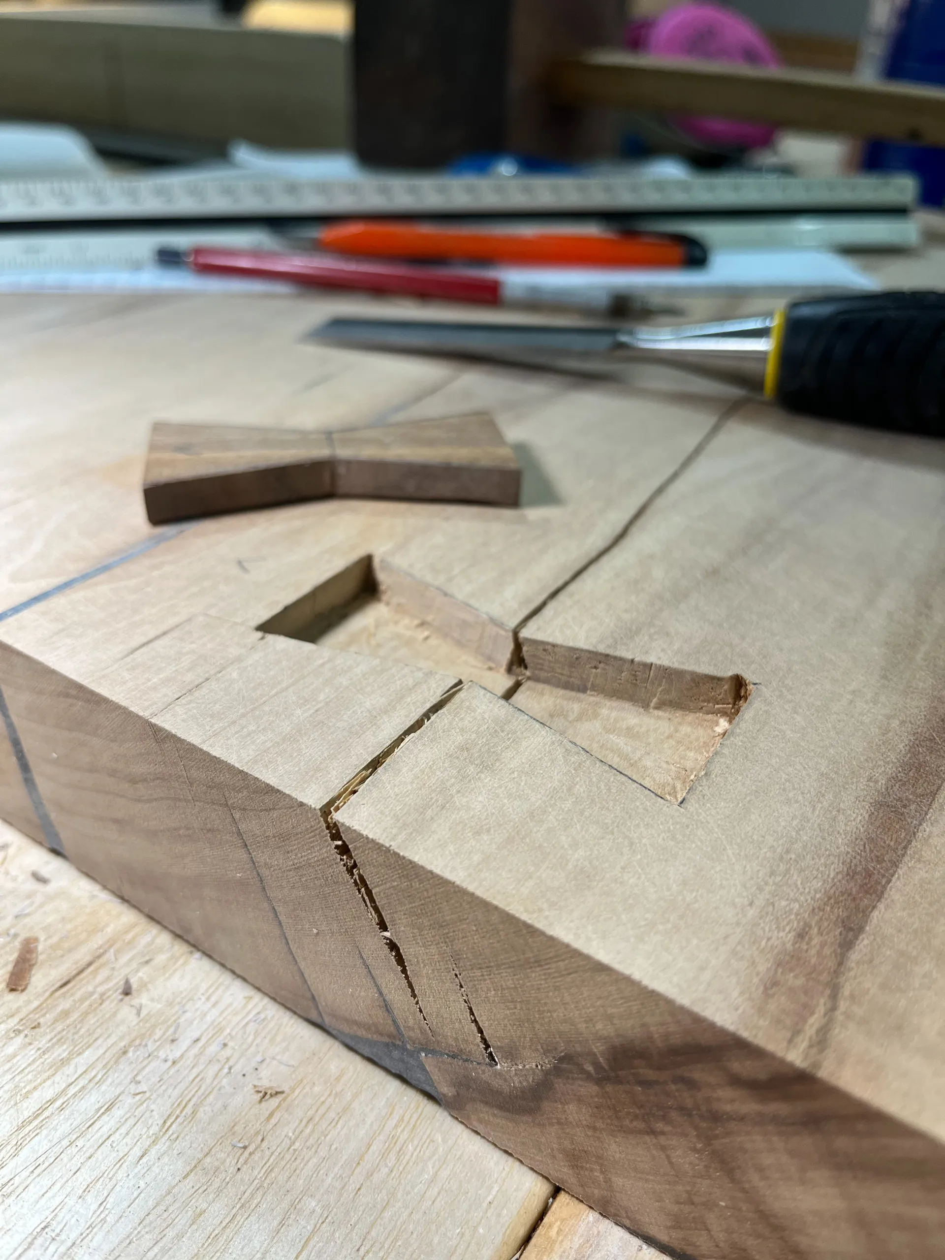 Sanding the cutting board's surface