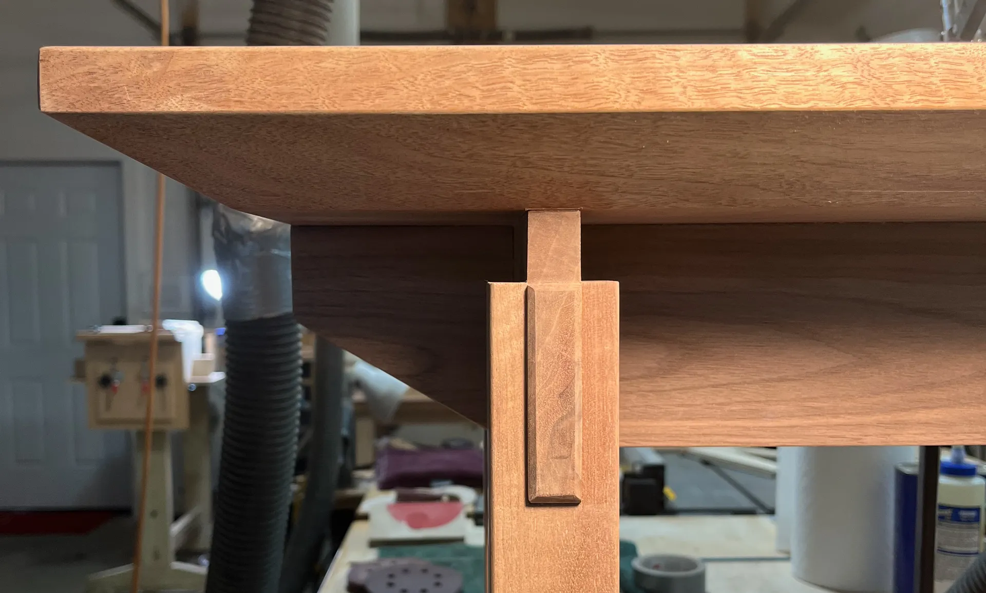 Raw walnut boards for the entryway bench seat