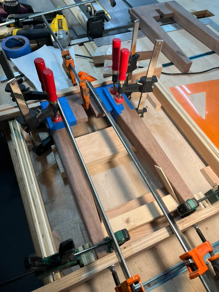 Sanding the entryway bench's walnut seat
