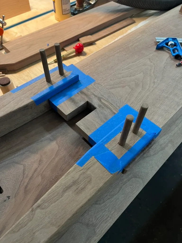 Walnut entryway bench leg detail before finishing
