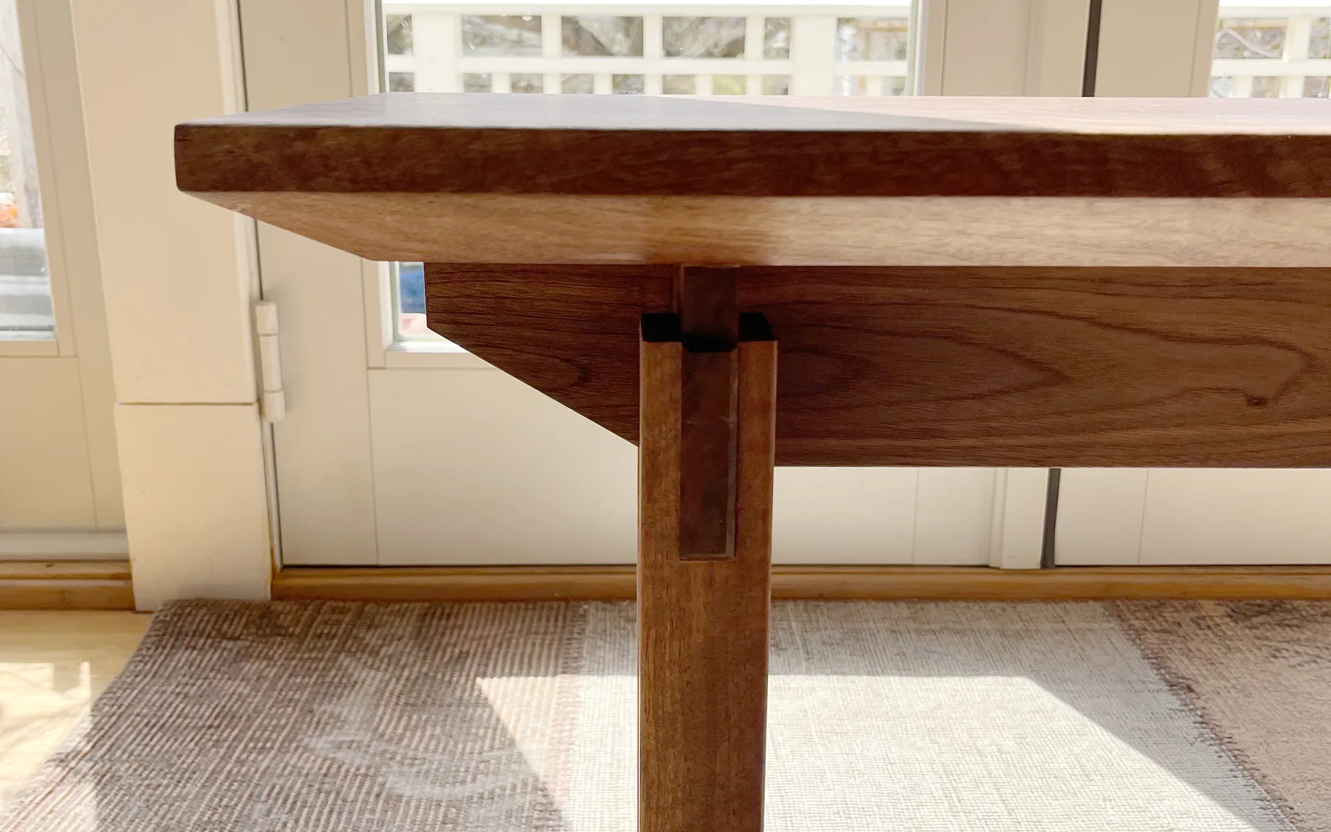 Walnut entryway bench seat and joinery detail