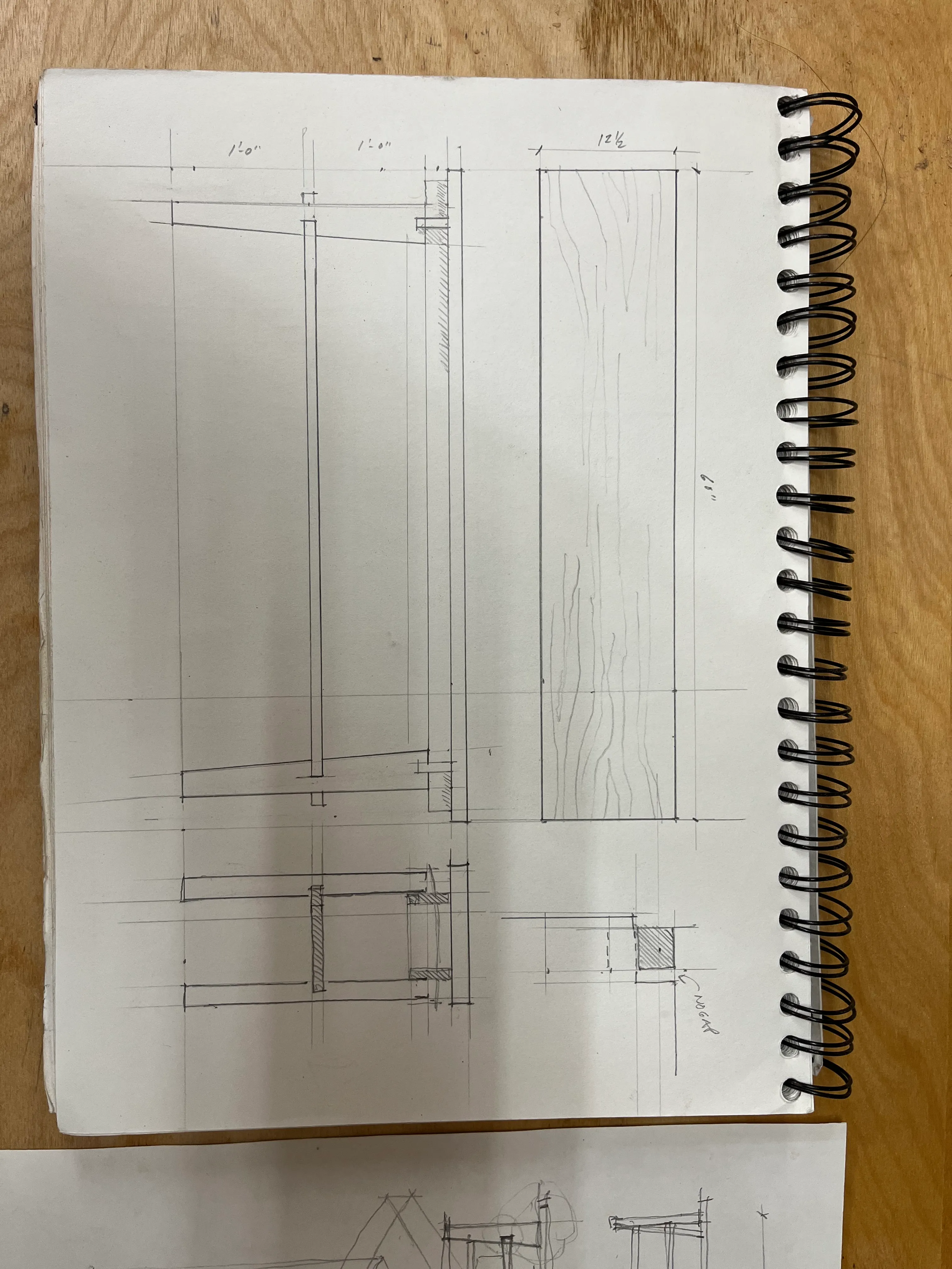 Sketchbook plans for the end table's leg and shelf dimensions, with a metal ruler and drafting tools