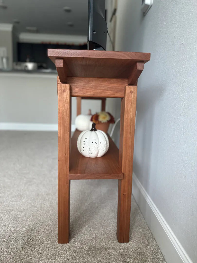 Cherry end table's lower shelf and joinery detail