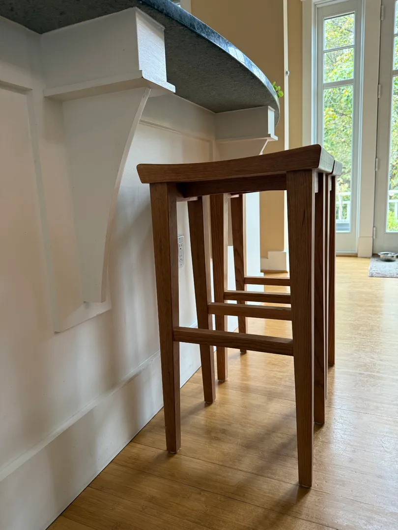 Cherry bar stool shown from a front angle