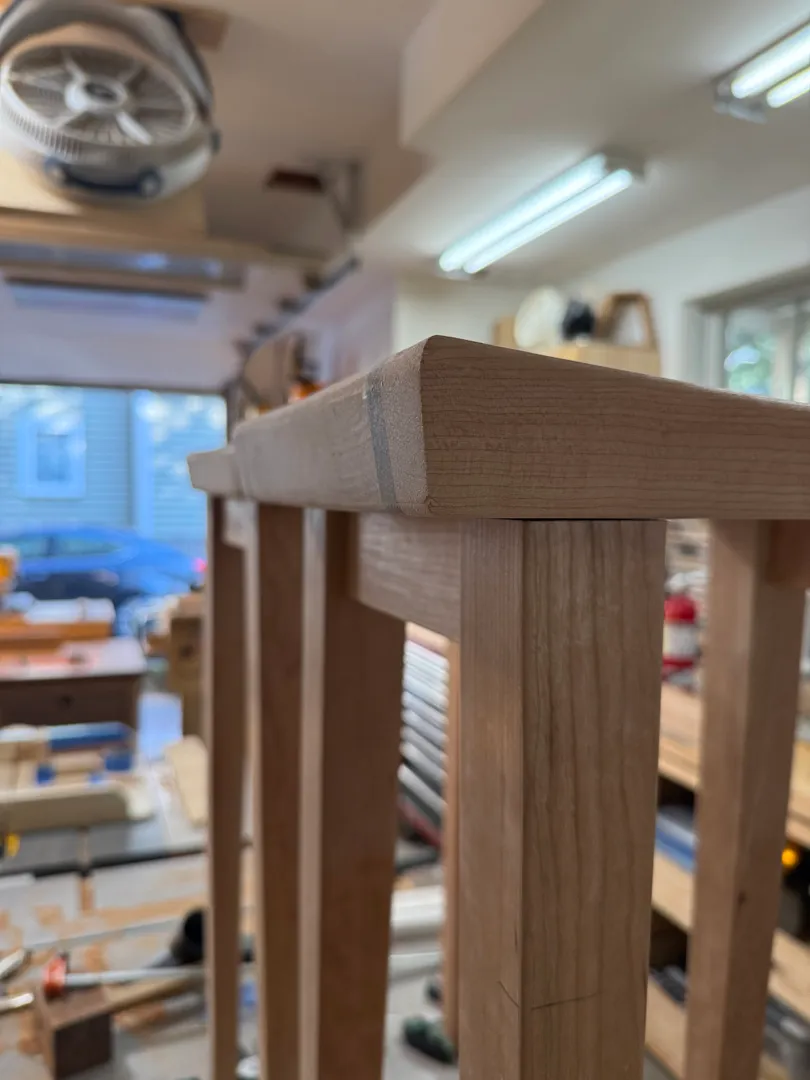 Cherry stool joinery detail mid-assembly
