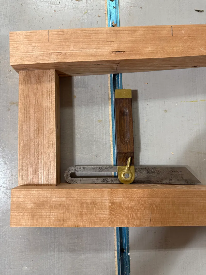 Stool stretcher joinery being cut