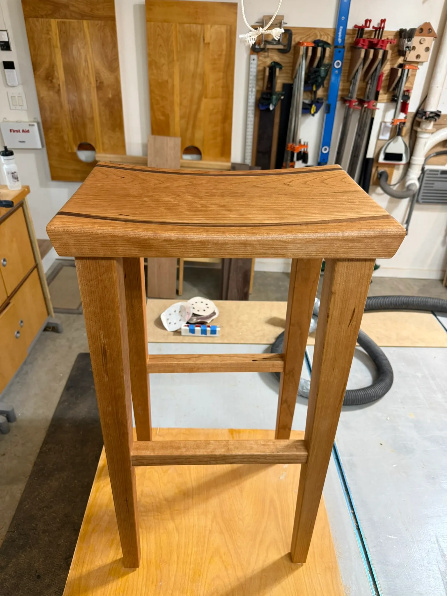 Cherry bar stool seat and stretcher joinery detail